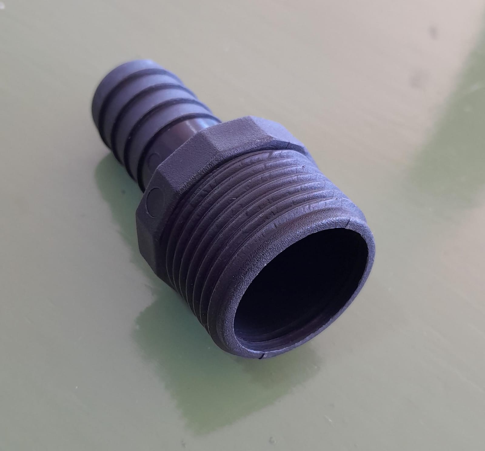 ESPIGA-ROSCA MACHO REDUC. POLIET. 3/4"X1/2" X UN